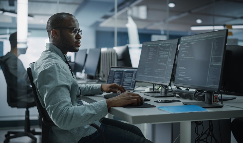 A TSP employee demonstrating IT talent