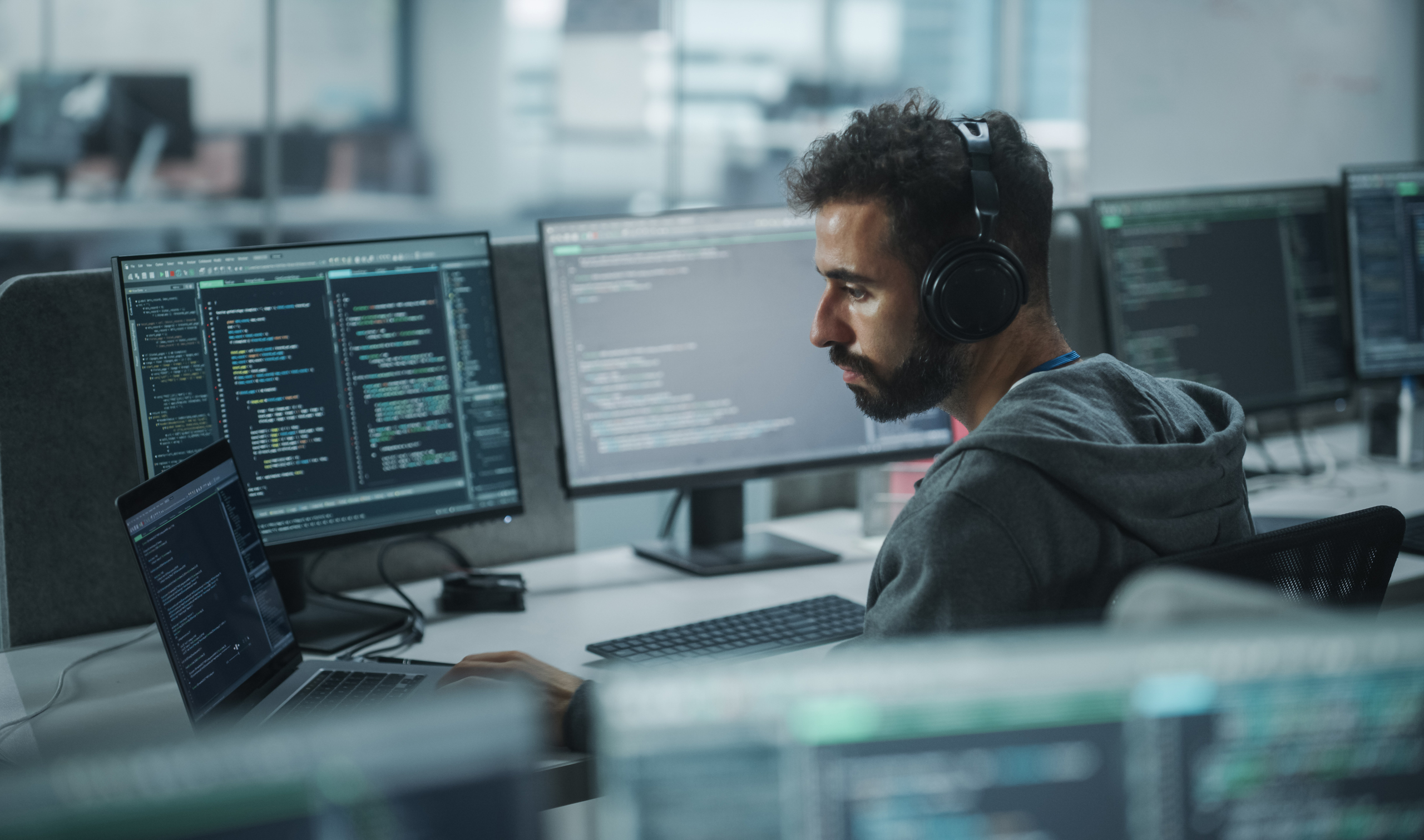 A TSP desktop support services employee looking at his computer